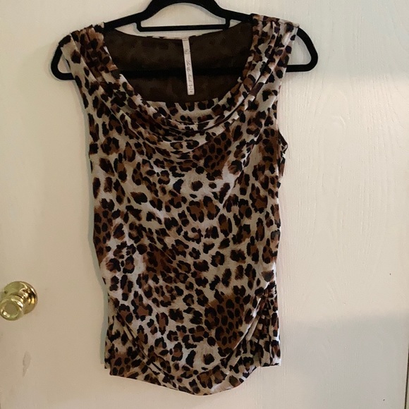 Leo & Nicole Tops - Leopard print blouse. M